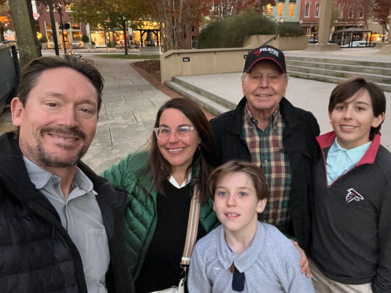 Becky Engram, second from left, with husband Derek, left, her father, Bruce Dunning, and sons Carter and Hudson, right, around Thanksgiving last year. Engram is part of the sandwich caregiver generation, being a parent to her boys while also caring for Dunning, who has heart issues.. (Photo courtesy of Becky Engram)