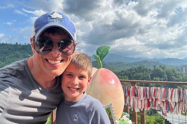 Chris posing with his son Carter